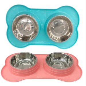 Two sets of pet feeding bowls with silicone mats, one blue and one pink.