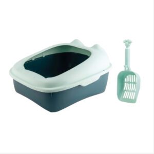 Cat litter box with a scoop beside it.