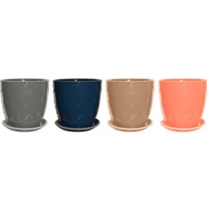 Four colorful ceramic plant pots with matching saucers in a row.
