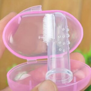 A pink case holding a transparent silicone finger toothbrush.