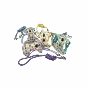 Three colorful pug-shaped coin purses with wrist straps.