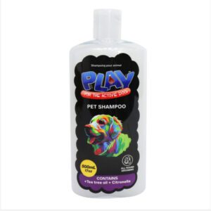 Bottle of Play Pet Shampoo with colorful fish design on label.